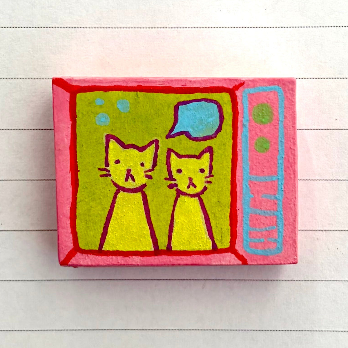 OFF THE WALL - cat on tv