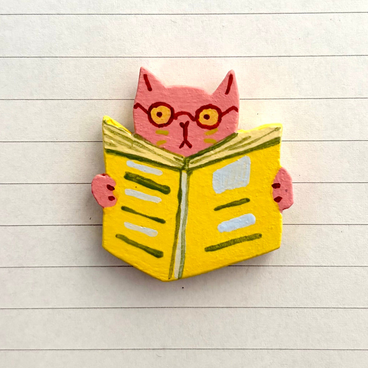 OFF THE WALL - reading cat