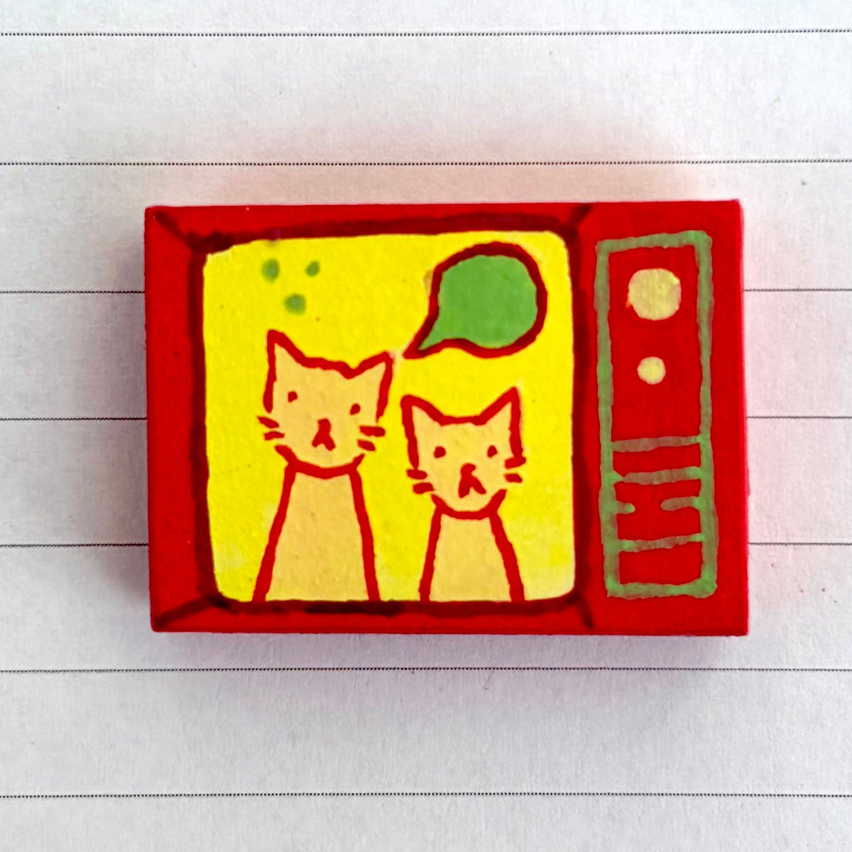 OFF THE WALL - cat on tv