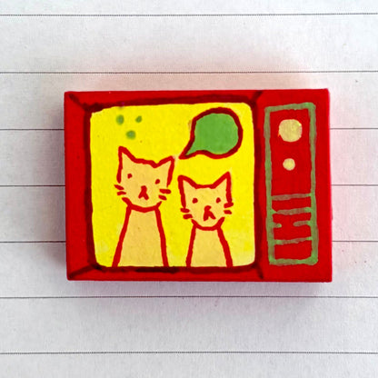 OFF THE WALL - cat on tv