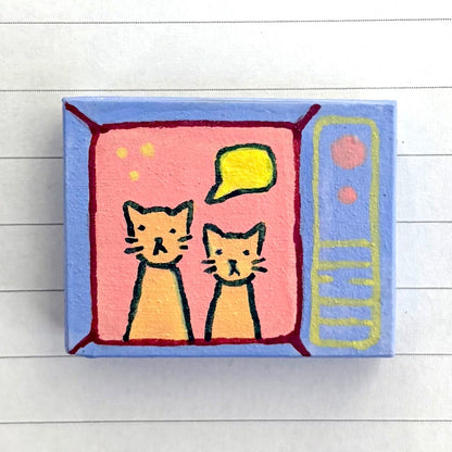 OFF THE WALL - cat on tv